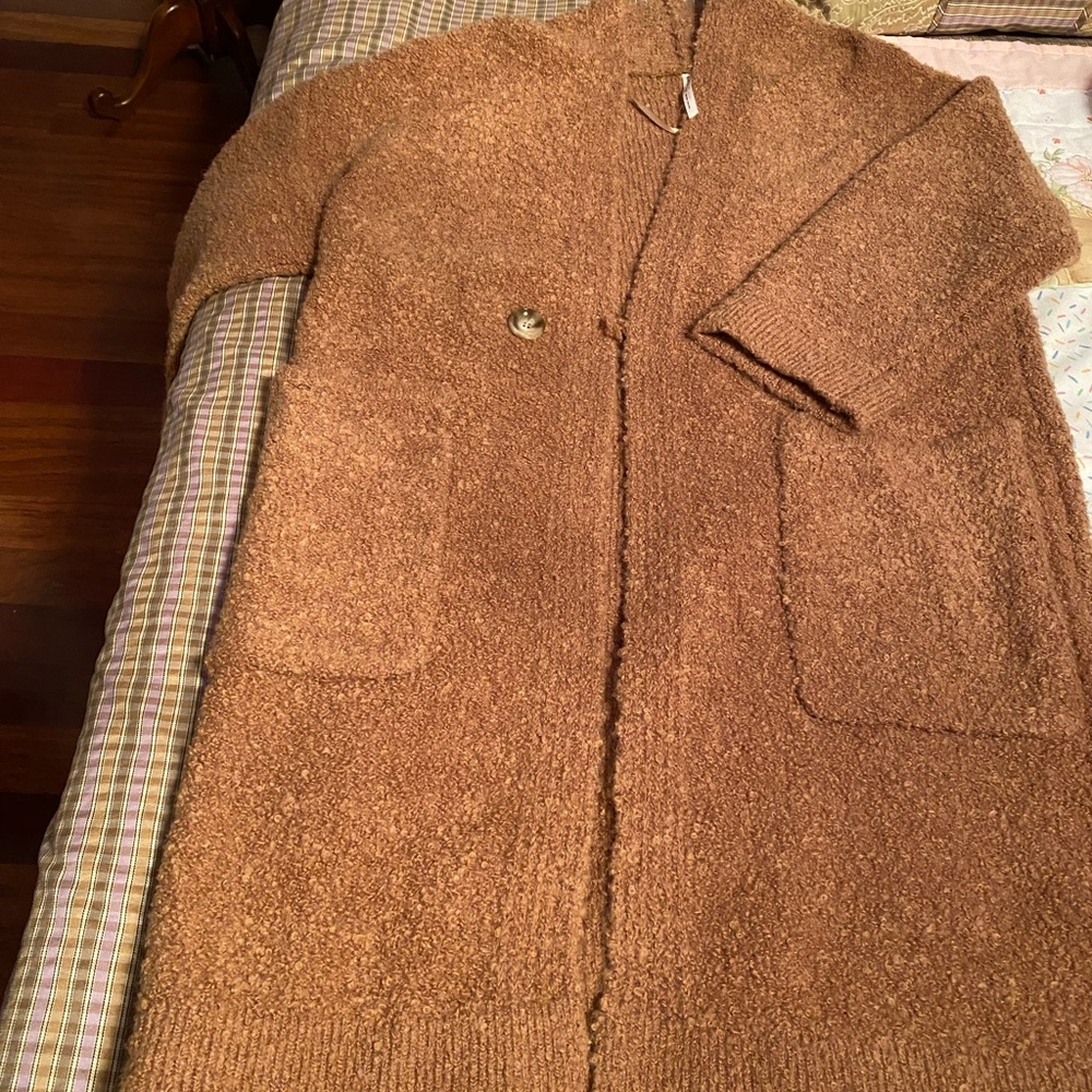 Long cozy sweater/robe. Perfect for lounging around in complete comfort.